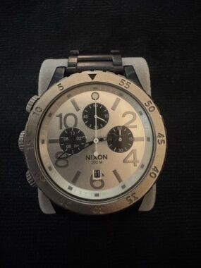 Nixon 48-20 Chrono Black stainless steel 48 mm case with matte link bracelet.
